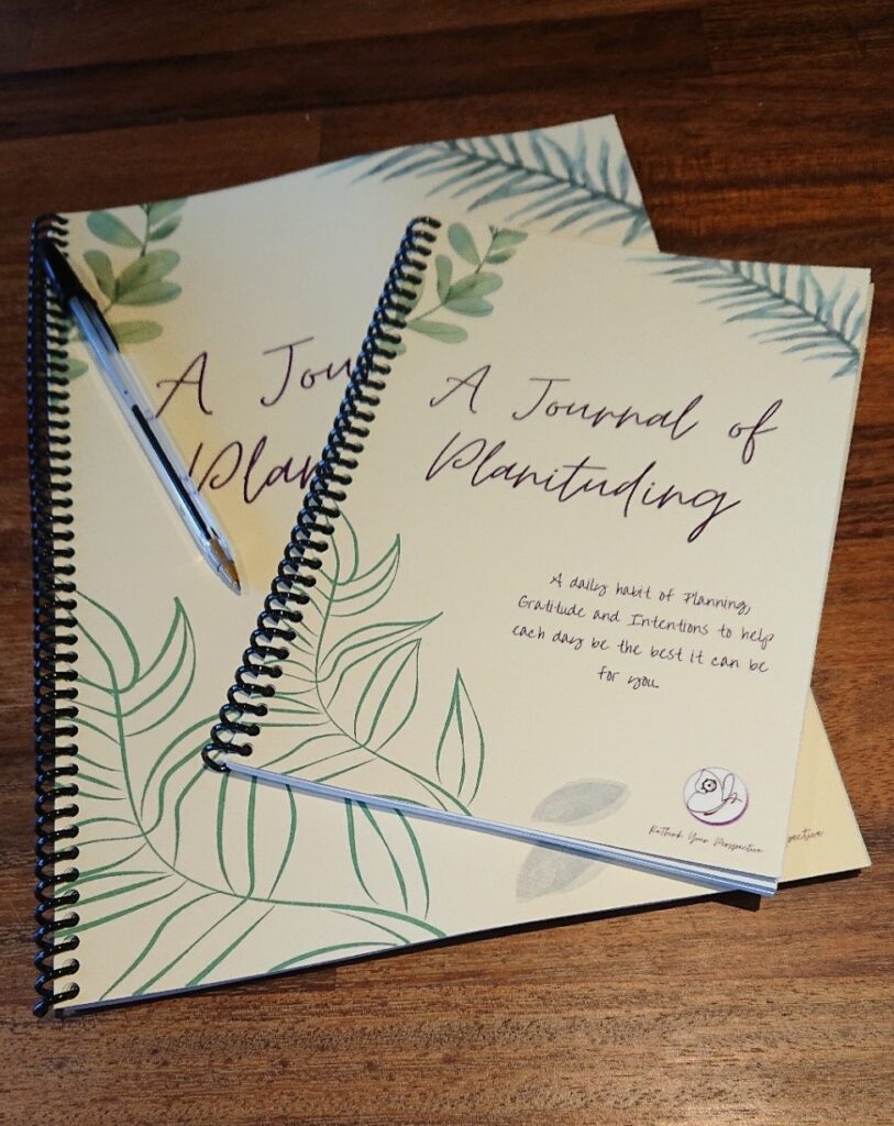 Printed A5 and A4 Planituding journals with ring spines.